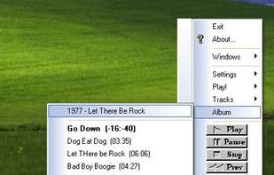 Browse your mp3 files from the system tray. Play / Pause by clicking the systray icon