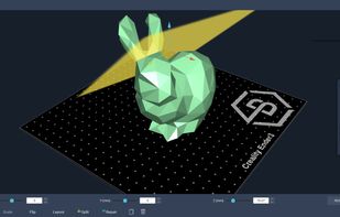 Black background with the low poly stanford bunny in green with a yellow splitting plane