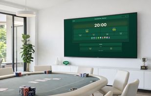 Modern poker blinds timer displayed on a large living room TV during a home poker game.