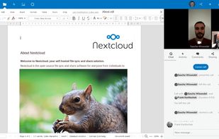 With live video collaboration. Using Talk in the right side bar.