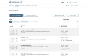 Job overview: all cron jobs at a glance, grouped in folders, with last and next run, schedule in plain words and quick actions. An alert icon flags jobs with recent failures.