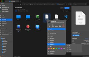 Browsing in dark mode: grid view with the right-click context menu, Finder-style color tags, and the preview panel showing file details at a glance.