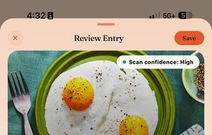 AI food photo scan with nutrition estimates and review before saving.