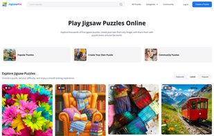 JigsawPix home page with featured puzzles, community creations, and access to the custom puzzle creator.