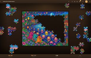 A puzzle in progress, with loose pieces around the board.