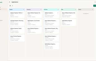 Kanban board view of applications, including health scores and alerts.