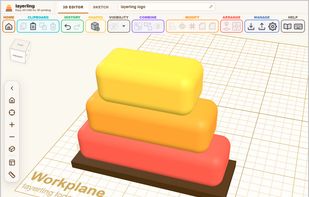 The 3D editor: a model on the workplane, with the ribbon above and the view cube top left.