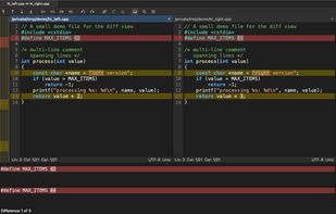 Dark theme with syntax highlighting: comparing C++ source files with WinMerge's classic navigation — differences are edited and merged in place.