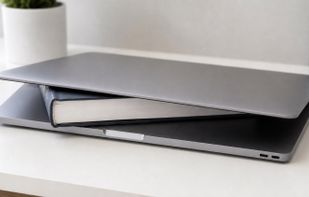 The hack lidawake replaces: a book wedged under the lid to stop the Mac sleeping.