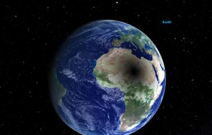 The shadow of the Moon on the Earth during a solar eclipse