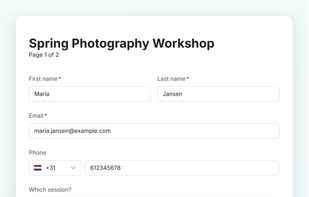 A published form as respondents see it: side-by-side fields, phone input with country code, and a custom theme.