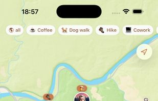 The map. Verified nomads parked nearby, each pin showing the activity they are down for today. The filter row across the top narrows the map to one activity: coffee, dog walk, hike, cowork. This is the whole app in one screen; there is no swipe deck.