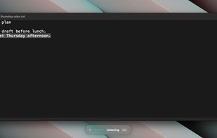 Dictating into a text file. The listening indicator sits at the bottom of the screen.