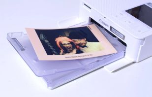 Or rent a printer for printing your guests' photos during the event! Why have a photo box at all?