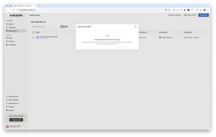 Media file upload interface, where users can drag and drop files to attach to deals or contacts for easy access and reference during the sales process.