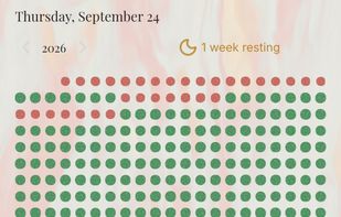 The year as a field of watercolor dots, with this week's habits below. Tap a circle to log a day.