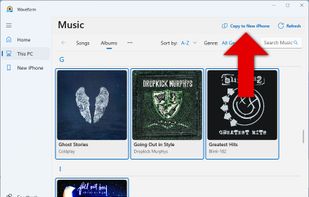 Copy music from PC to iPhone.