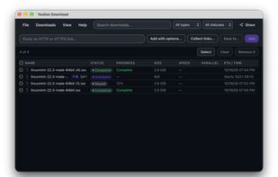 The download list, with completed, paused and scheduled transfers side by side.